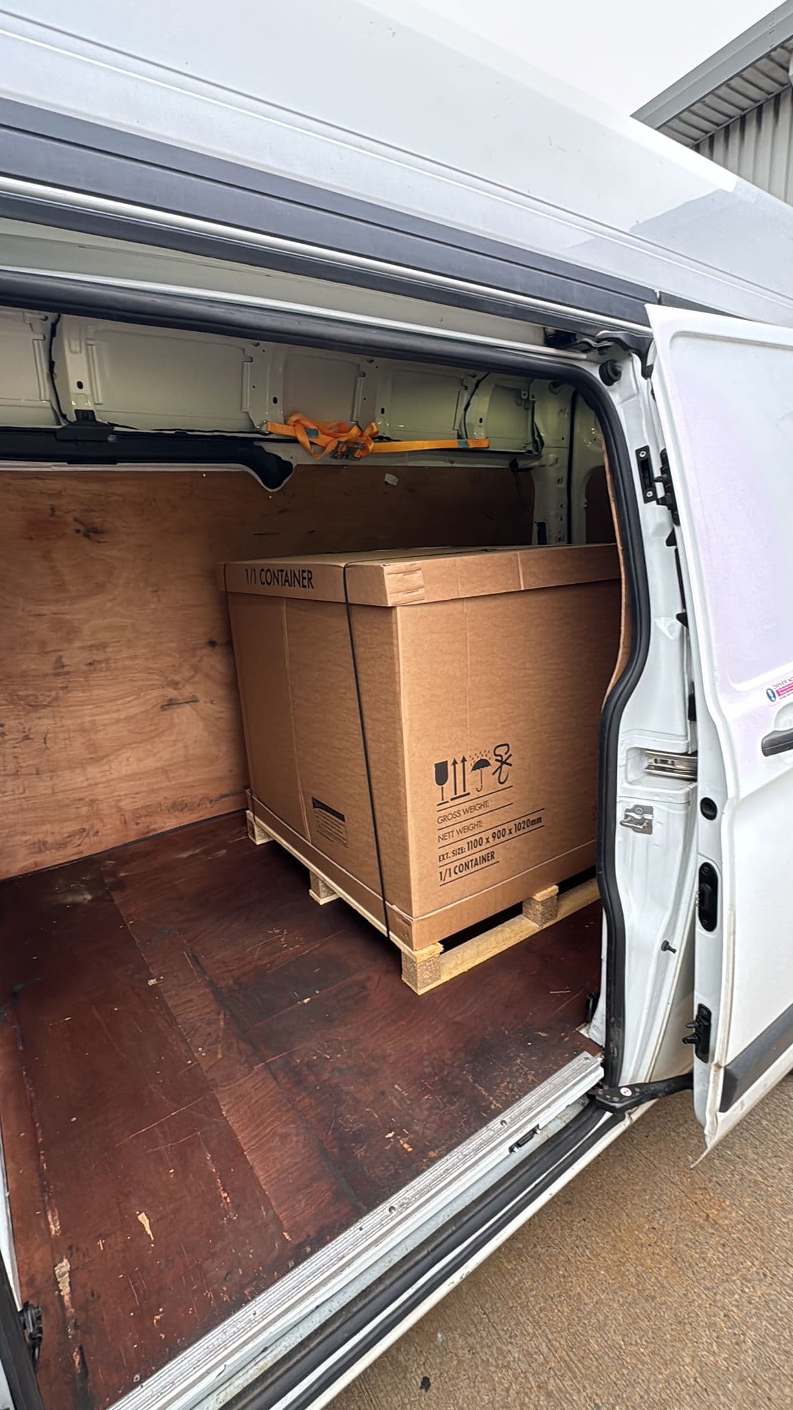 Large pallet crate loaded in the van ready for drop-off