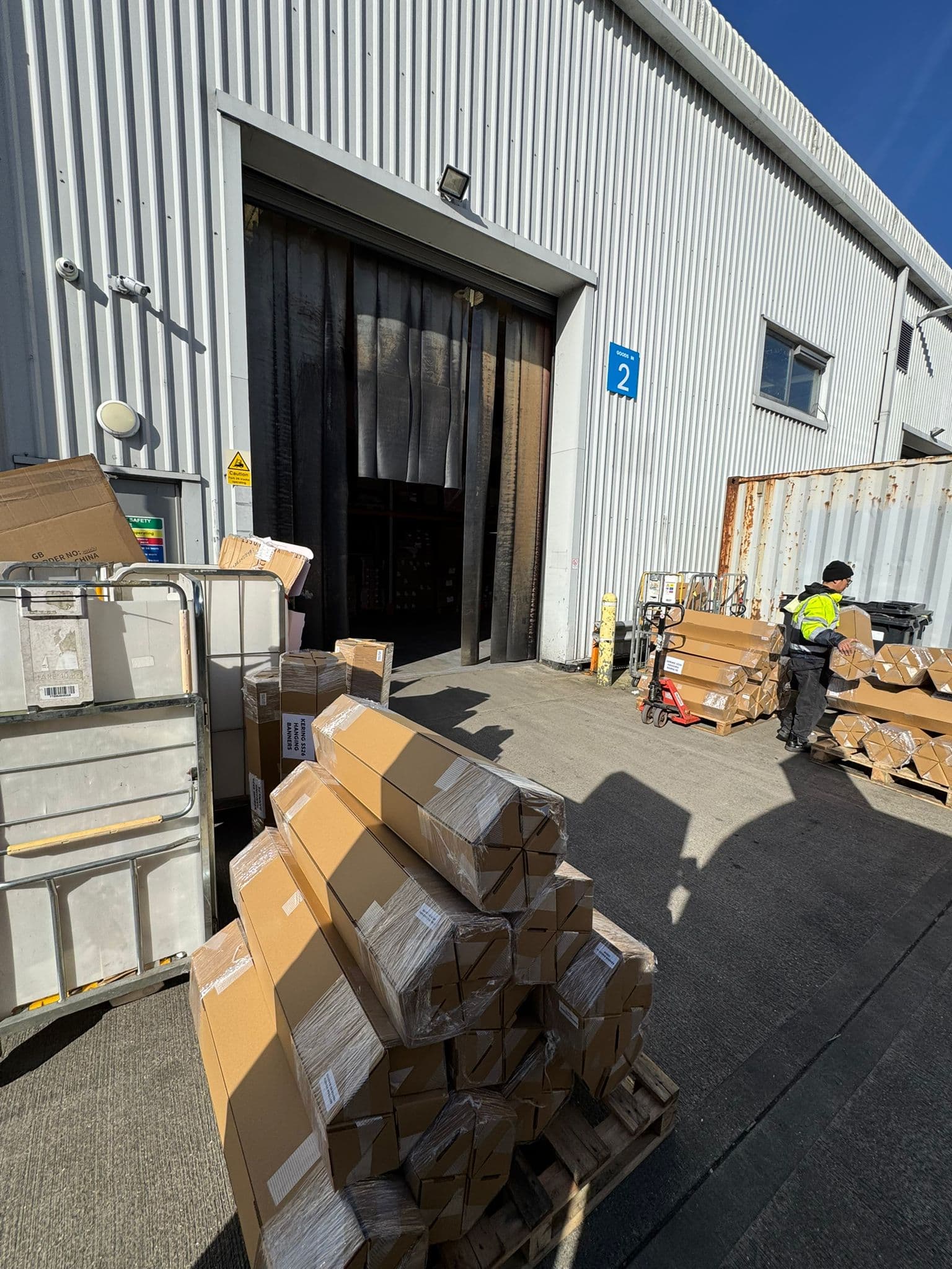 Warehouse loading bay — B2B collection of palletised goods